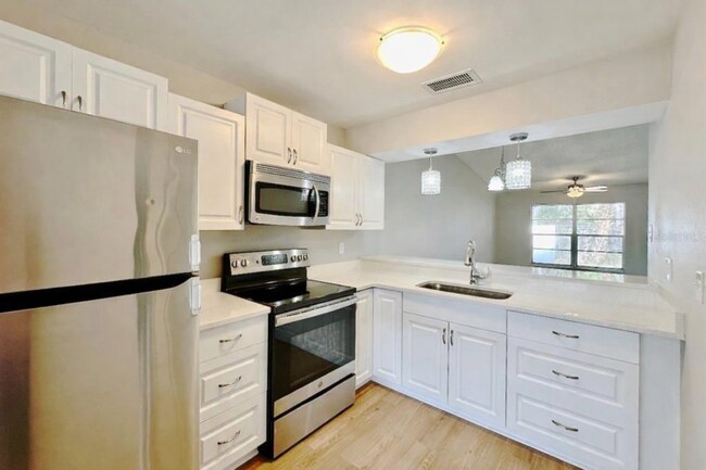 Photo - 7135 Parkside Villas Dr N Unit 7135