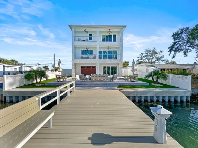 Photo - Waterfront Johns Pass Luxury | Steps to Beach + Pool, Hot Tub & Dock