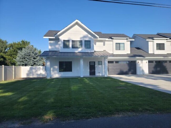 Photo - Brand New 4 Bed 3 Bath Modern Farmhouse Style Duplex in Mead with over 1850 Sq. Ft. on Huge Lot. Unit 12110 N. Freya Duplex