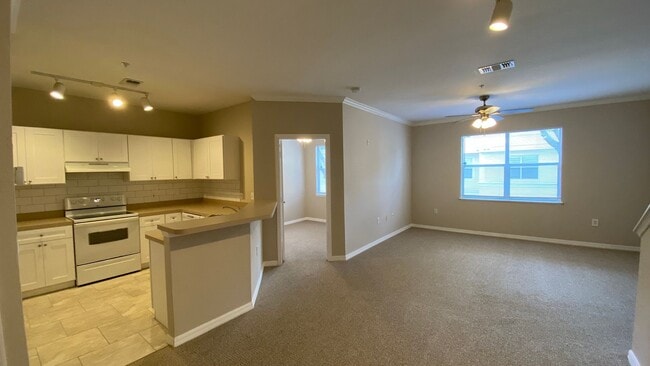 Photo - Spacious 2BR/2BA Visconti Townhome with 2-Car Garage, Den and Washer/Dryer!