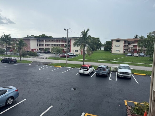 Building Photo - 4730 NW 10th Ct Unit 210
