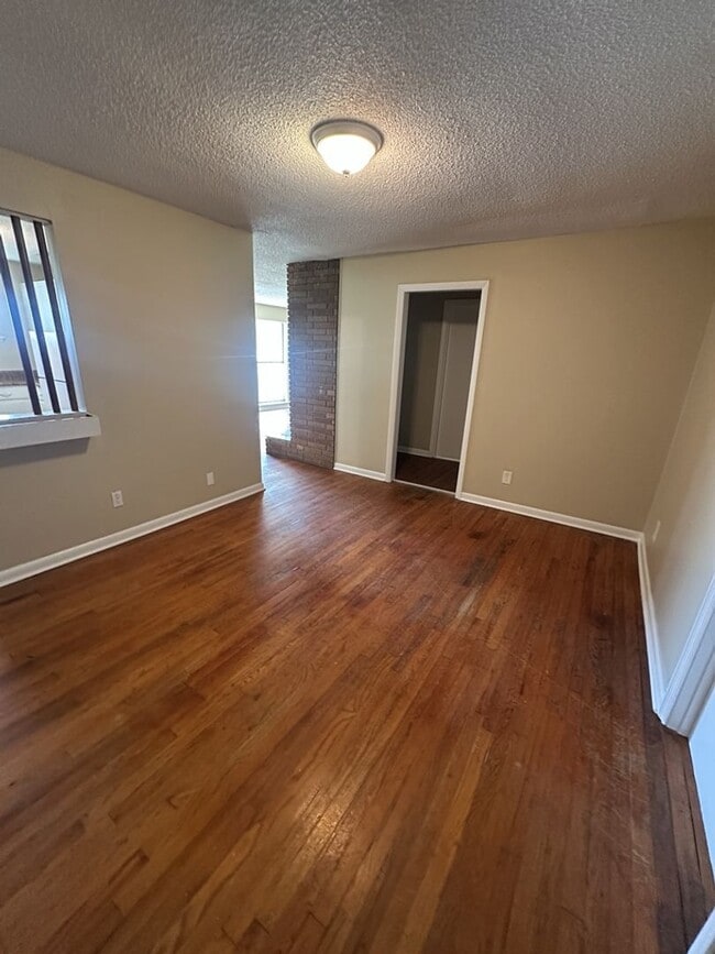 Photo - Bright 4BR Home with Fenced Yard, Hardwood Floors & Garage on Rankin St