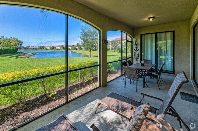 Building Photo - 9512 Napoli Ln Unit 101 Rental