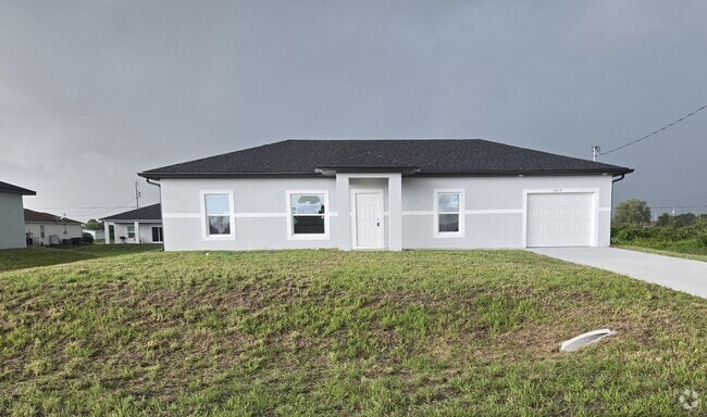 Building Photo - BRAND NEW THREE BEDROOM, 2 BATH, 1 CAR GAR... Rental