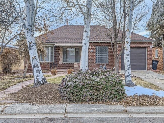 Photo - Evolve Real Estate: Available 8/8/26 Brick Tudor with Large Yard and Finished Basement!