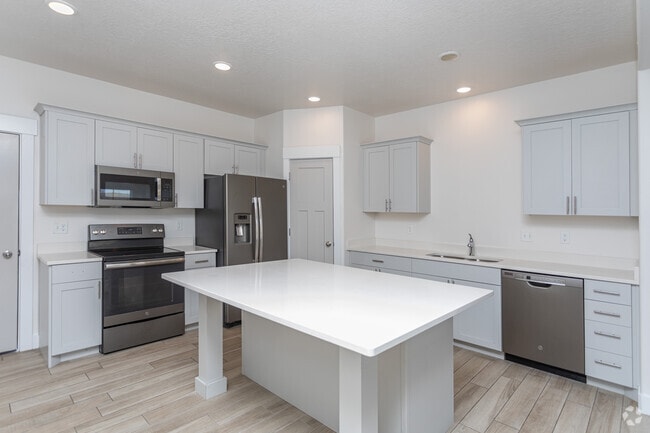 3BR, 2.5BA - 1,521SF - Kitchen - Porter Ranch Townhomes