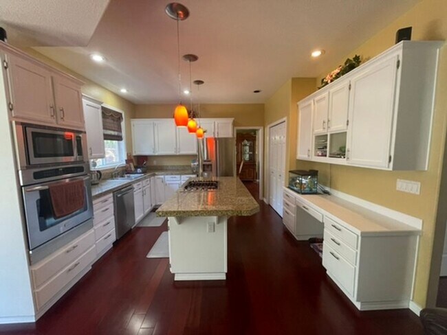 Photo - Spacious 4-Bedroom Home with Gourmet Kitchen, Primary Suite & Backyard Garden in Bethany