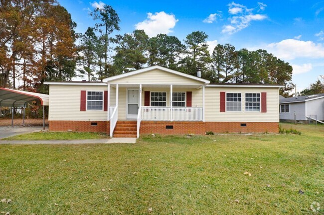 Building Photo - Fresh & Clean! 3 BR, 2 BA Home w/ Carport ...