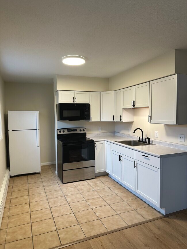 Building Photo - 2537 138th Ave NW Unit 4