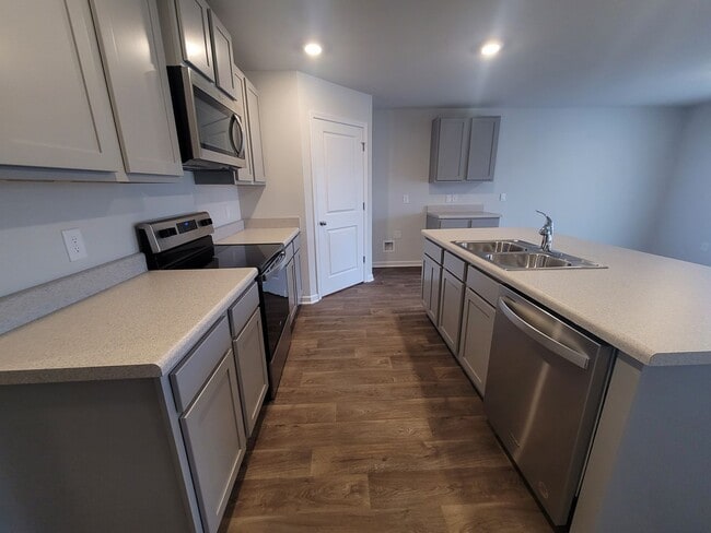 Photo - Welcome to our brand new 4-bedroom, 2-bathroom home located in the charming community of Castle H...