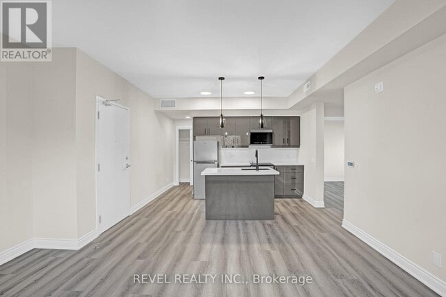 Photo - 261 King St E Unité 2D