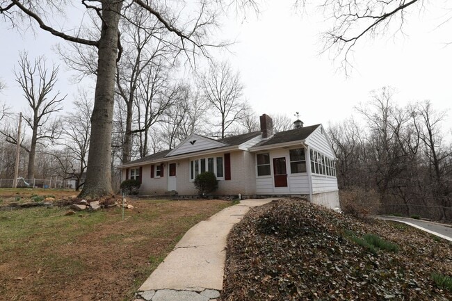 Photo - Charming 2-Bedroom Home with Spacious Yard & Sunroom – $1,600/Month