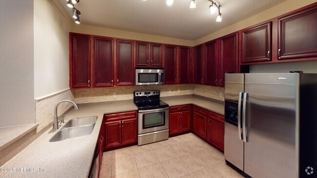 Building Photo - 8241 Pelican Landing Rd Unit 302 Rental