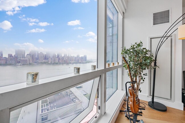 Building Photo - 77 Hudson St Unit 3204