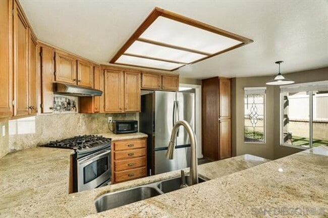 Photo - Beautifully Remodeled Home with outdoor Kitchen and Spa!
