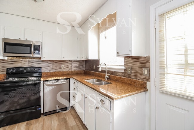 Photo - The living is easy in this 3 bedroom, 2.5 bathroom home