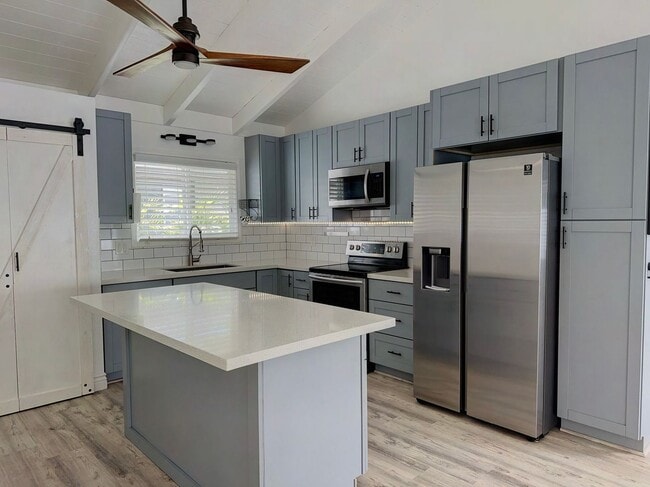 Photo - Mililani Town Living with PV, Tesla Batteries & EV Charger