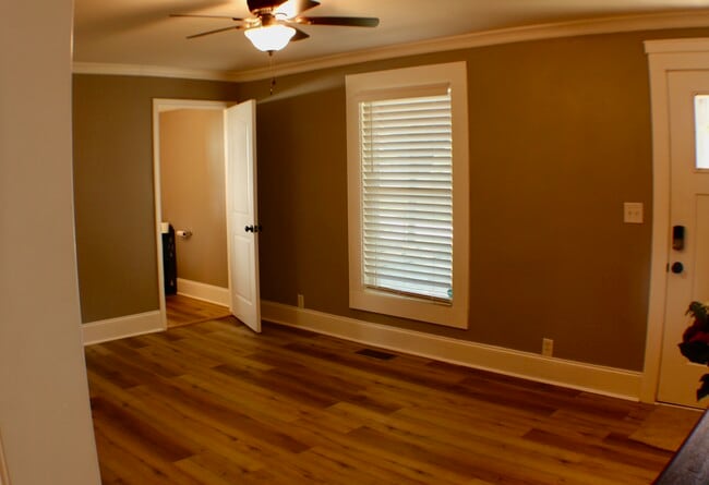Living room wih entrance into the bathroom - 311 Paris Mountain Ave