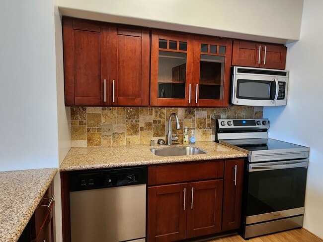 Building Photo - 6363 Christie Ave Unit 2114 Rental