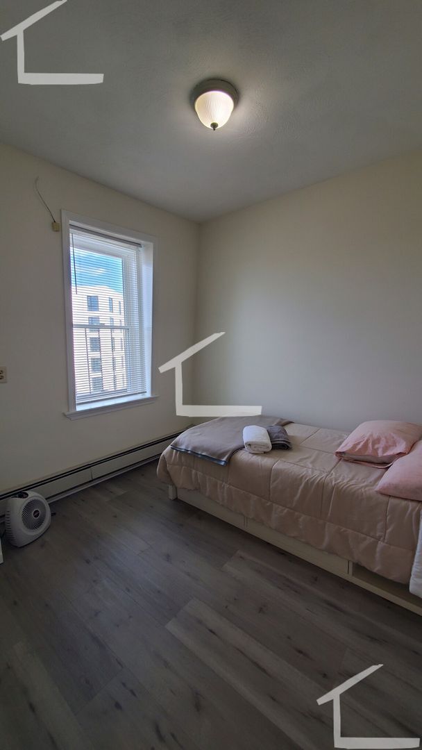 Photo - Conveniently located, beautifully maintained Apt with modern appliances.  A/C.  Near Public Trans...