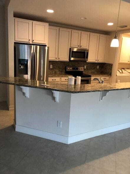 Building Photo - 10320 SW Stephanie Way Unit 7210