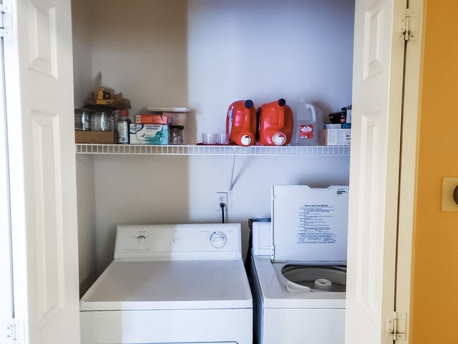 Laundry in hall closet - 1430 W Westbury Way Unidad L