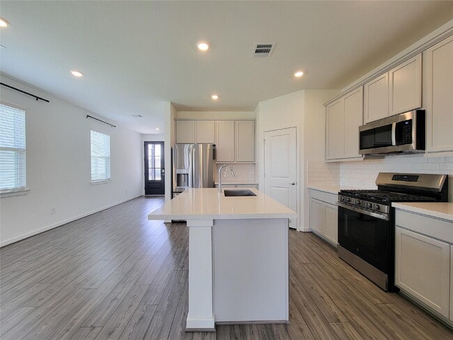 Photo - "Charming 4-Bed Retreat on Primrose Myrtle Ln, Cypress - Spacious Living with 2.5 Baths!"