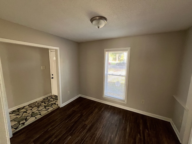 Photo - Spacious 4BR/2BA Memphis Home | 1,913 Sq Ft, Hardwood Floors, Brick Fireplace & Fenced Yard