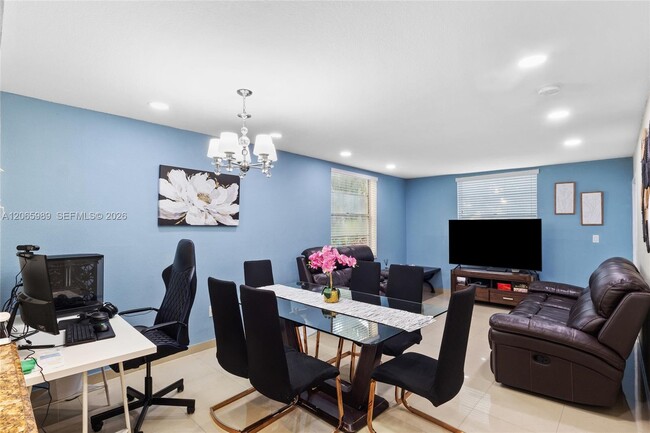 Building Photo - 5665 W 20th Ave Unit 212