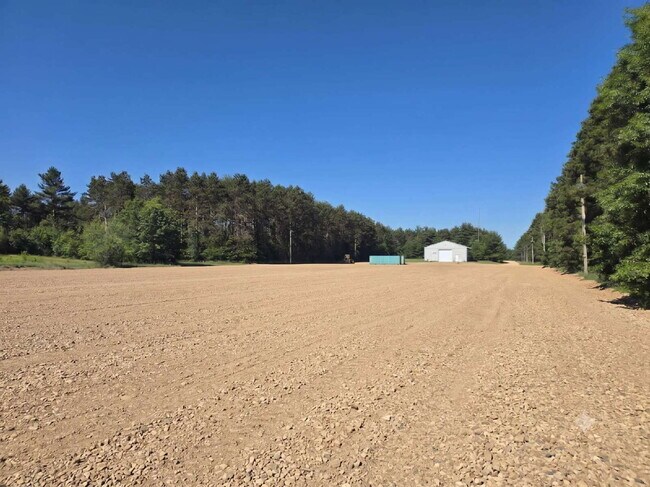 24.2 Acres – Industrial Warehouse, Residential Or Office Space, Pole Shed & Recreational Land