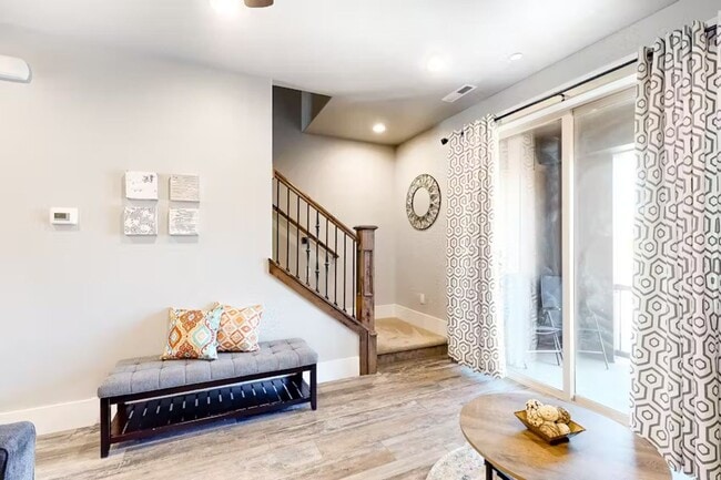 Photo - Clean 3 Bedroom Furnished Park's Edge Townhouse with A/C and 2 Car Garage