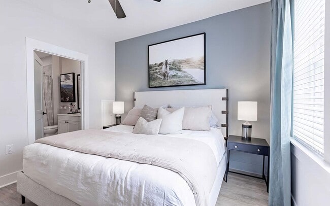 The bathroom opens right off the bedroom, which keeps mornings simple.
