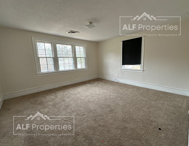 Photo - 3BR/2BA | Two Stories | Large Living Room & Dining Room