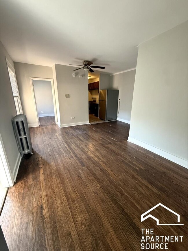 Building Photo - 6949 S Paxton Ave Unit 3C