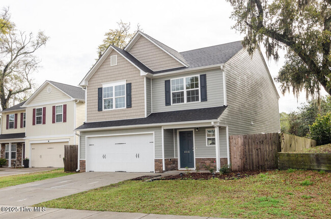Building Photo - 6516 Rustling Leaves Way Rental