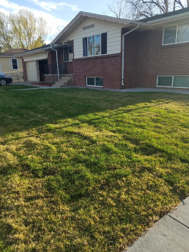 Photo - ***AVAILABLE NOW***
Spacious 4-Bedroom Wheat Ridge Home with Finished Garden Level and Two-Car G...