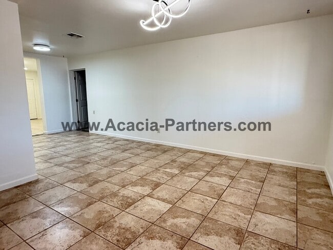 Building Photo - Three Bedroom Home