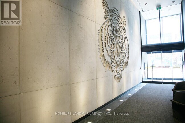 Photo - 28 Wellesley St E Unité 306