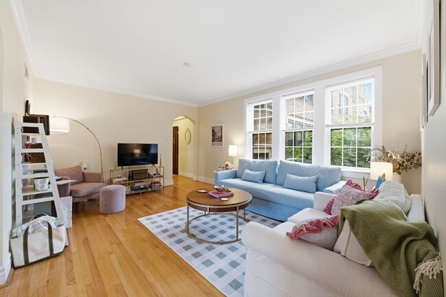 Staged Living Room with Sunlit Windows – 1,220 Sq Ft 2BR, Wydown-Skinker 63105 - Rosebury Rentals