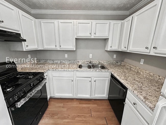 Photo - 2 Bed/1.5 Bath Townhome with Modern Amenities / Pet-Friendly / Coming Soon!