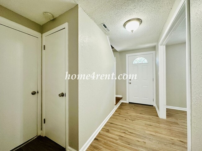 Photo - Updated Raytown Ranch w/ Wood Floors, SS Appliances, Finished Basement and a Fenced Yard!