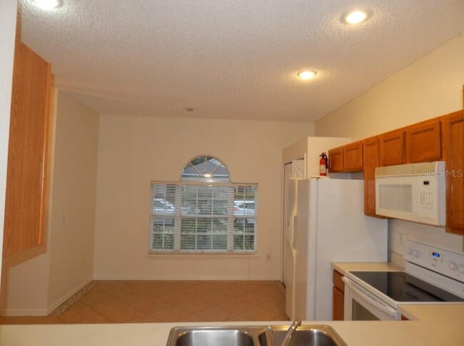 Photo - **Charming 4BR/2BA Pond-View Home with Boat Ramp Access – East Orlando **