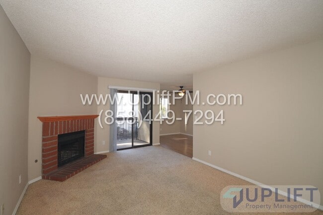 Building Photo - CHARMING 2BR/2BA CONDO W/ GARAGE