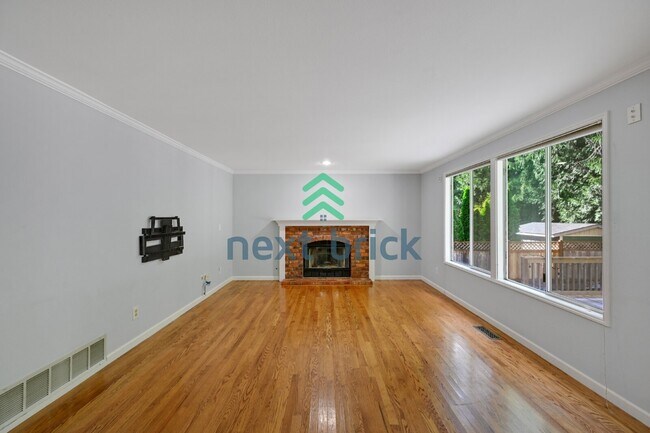 Photo - "Spacious 4-Bedroom Retreat with 2.5 Baths in Charming Sammamish Setting"