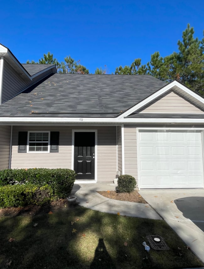 Building Photo - Spacious 3BR Townhome with Main-Level Primary Suite