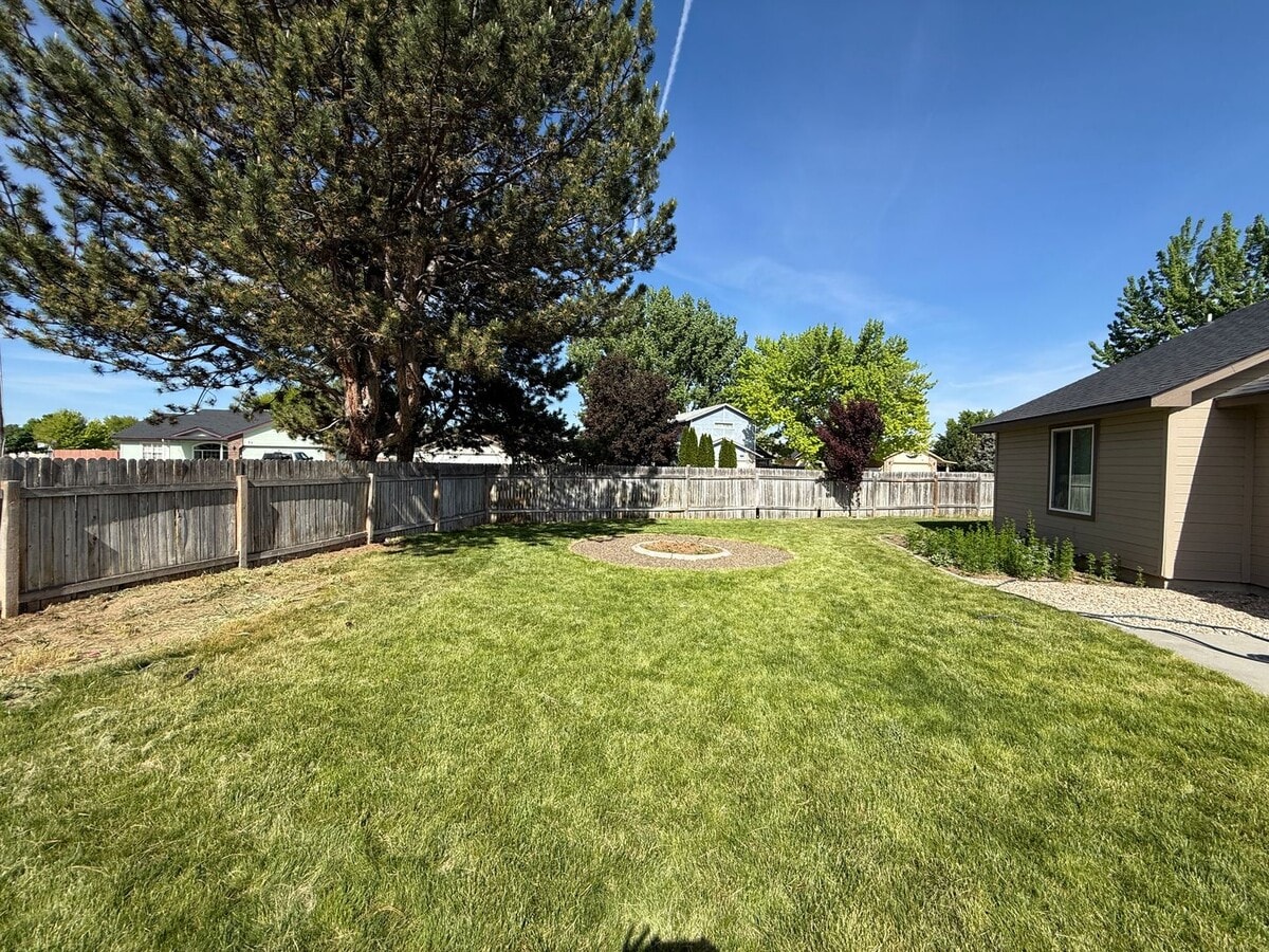 Photo - Updated 4-Bedroom Corner Lot Home with New Flooring, Carpet & Fresh Interior Paint