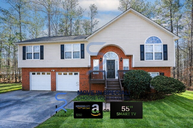 Building Photo - Move in before January 31st and choose your reward: a $250 Amazon Gift Card or a 55" Smart TV!