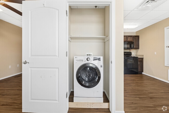 1BR, 1BA - 600SF - In-unit Laundry and Living, Dining Area