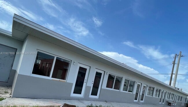 Building Photo - 2196 Ali Baba Ave Unit 8