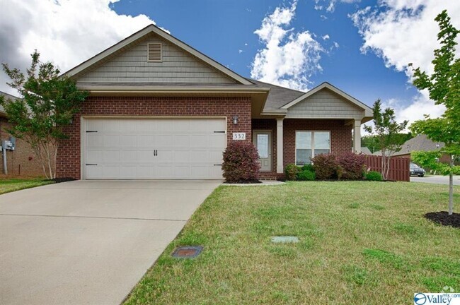 Building Photo - SPACIOUS FOUR BEDROOM BRICK HOME